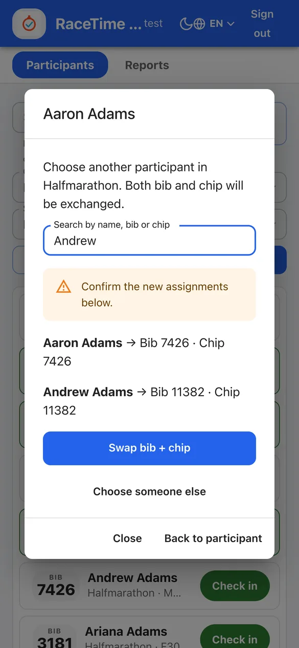 Bib and chip swap review showing the new bib and chip for both runners before confirming